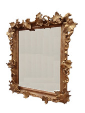 Specchiera dorata con foglie e