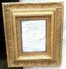 specchio con cornice dorata